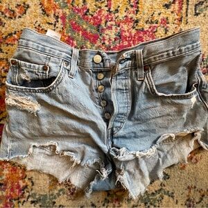 Iconic Levi 501 distressed cut off light wash denim shorts